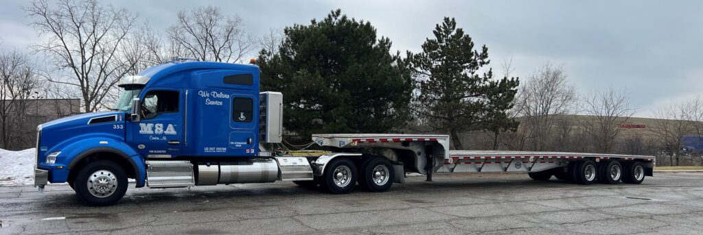 The open step deck trailer allows for loads up to 9' L on the top deck and up to 43' L on the main deck